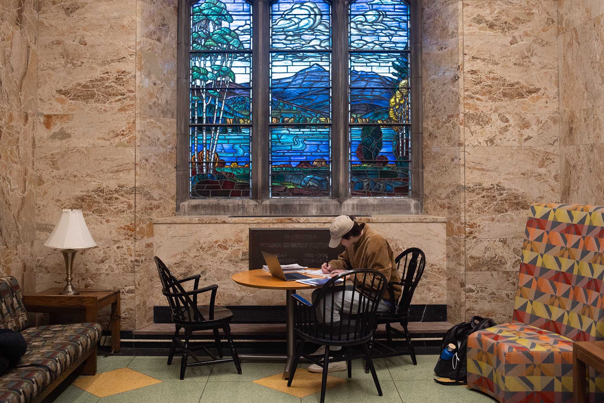 Photo: Biology student Conner Pendola (CAS'26) prepares for a biology exam in one of the College of Arts & Science's comfy study spaces