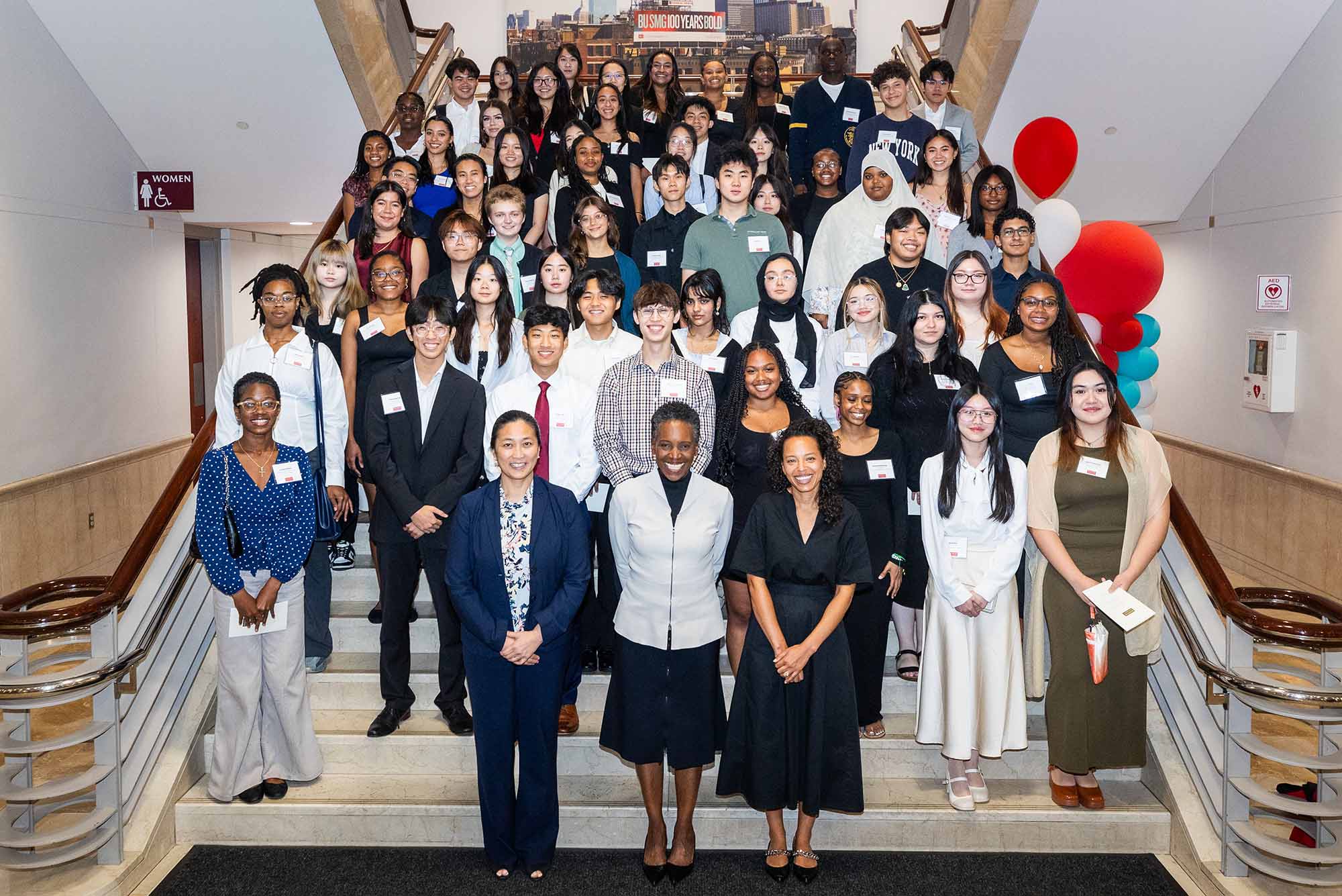 Photo: This year’s class of Boston Public Schools students earning Thomas M. Menino Scholarships and Community Service Award winners at a reception in the lobby of the Questrom School of Business
