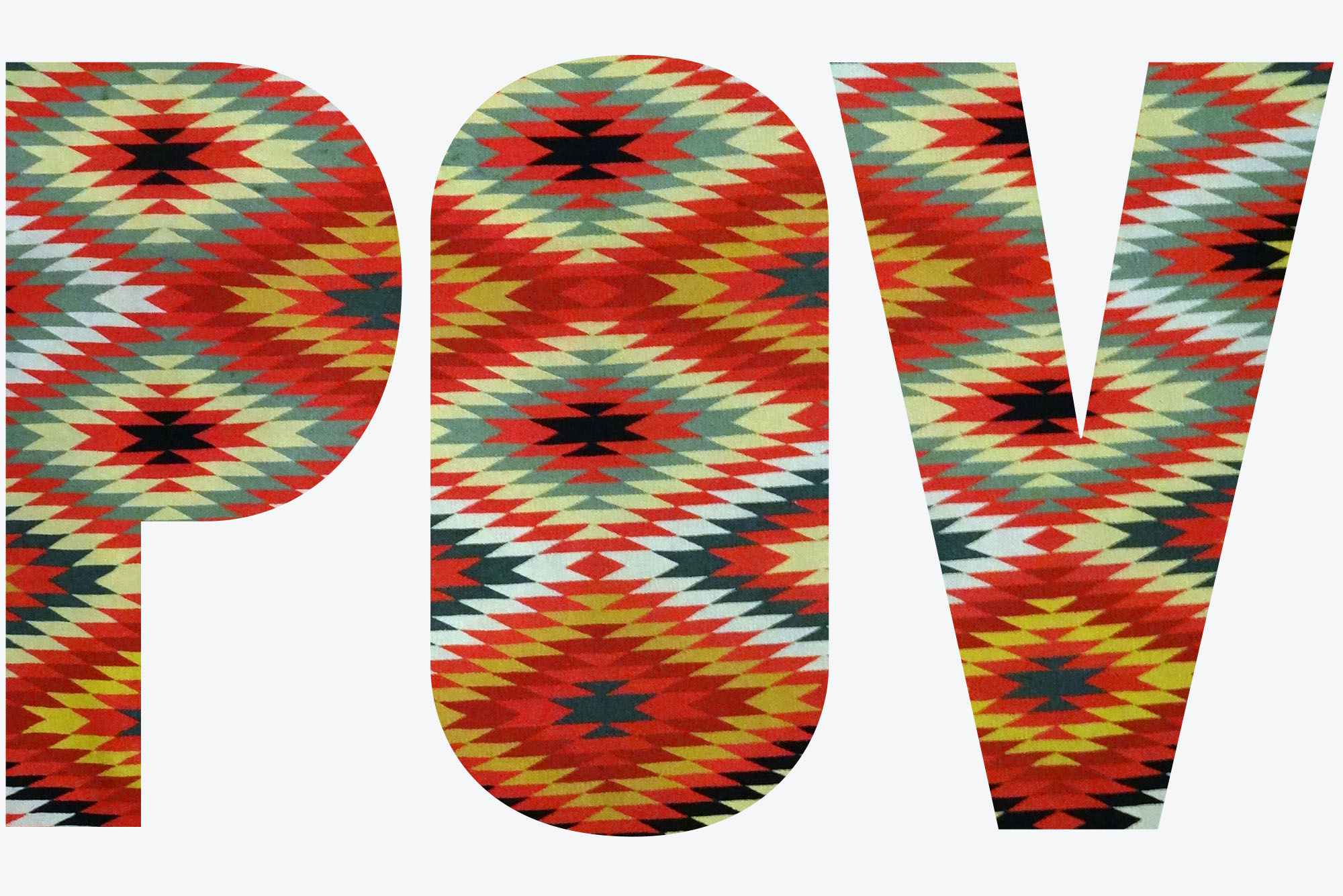Photo: A patterned navajo blanket with red, orange, green, and blue colors. The letters POV are visible on top of the image