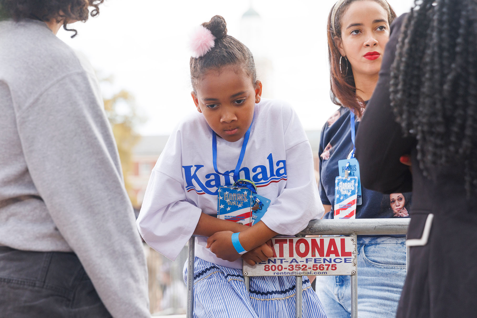 Photo: A young Black girl wearing a Kamala Harris shirt looking dejected