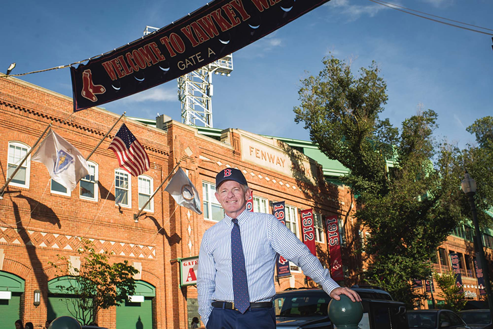 Photo: BU Professor Tom Whalen poses for a photo in front of Fenway Park