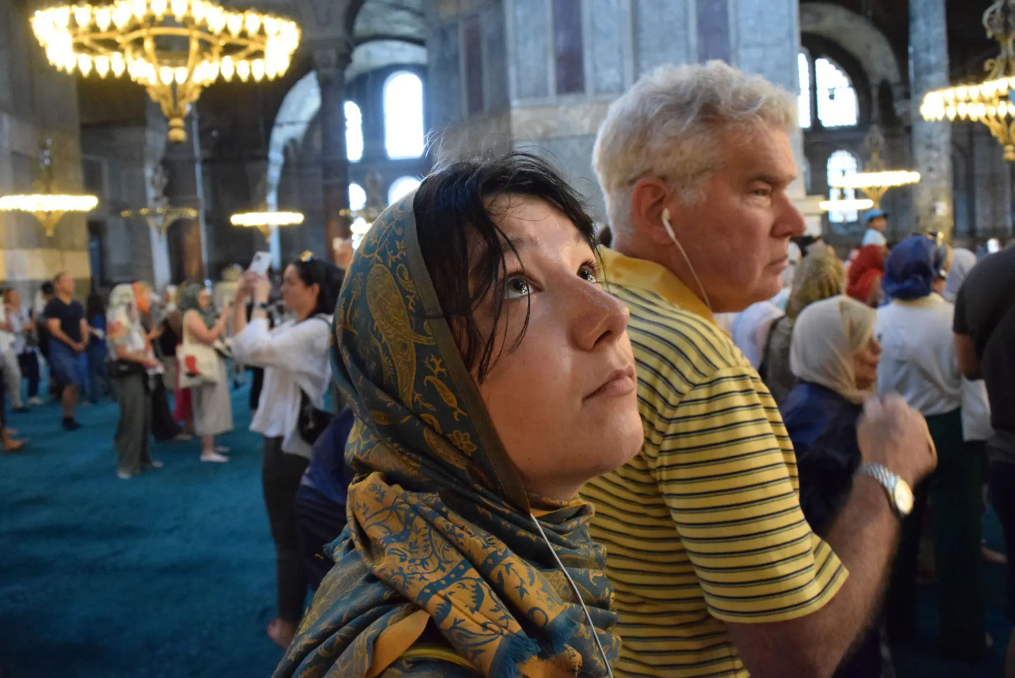 Photo: A young woman in a hijab at the Hagia Sophia, a Turkish mosque that once was an Orthodox church