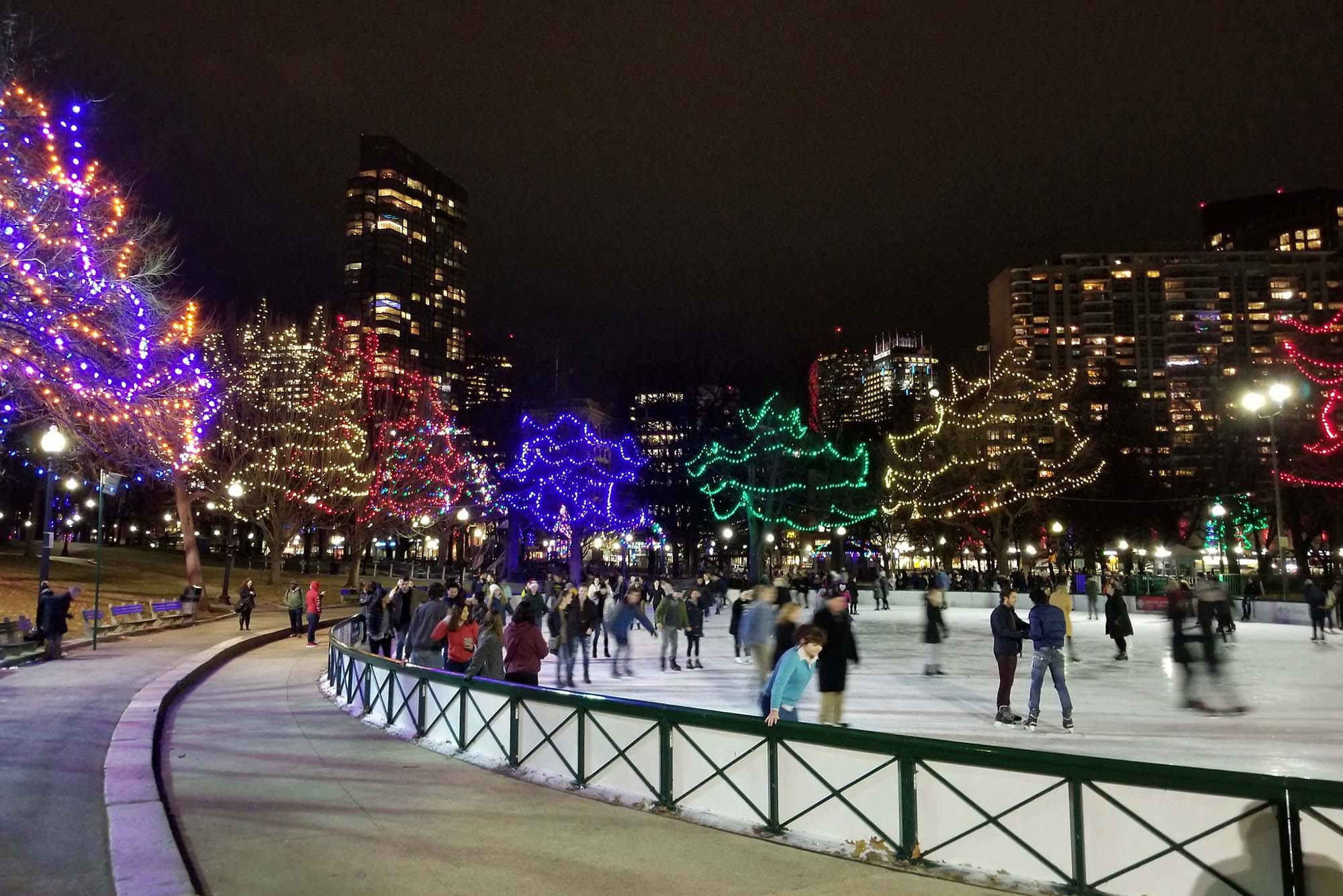 Photo: People skate on the Boston Frog Pond at Nighttime