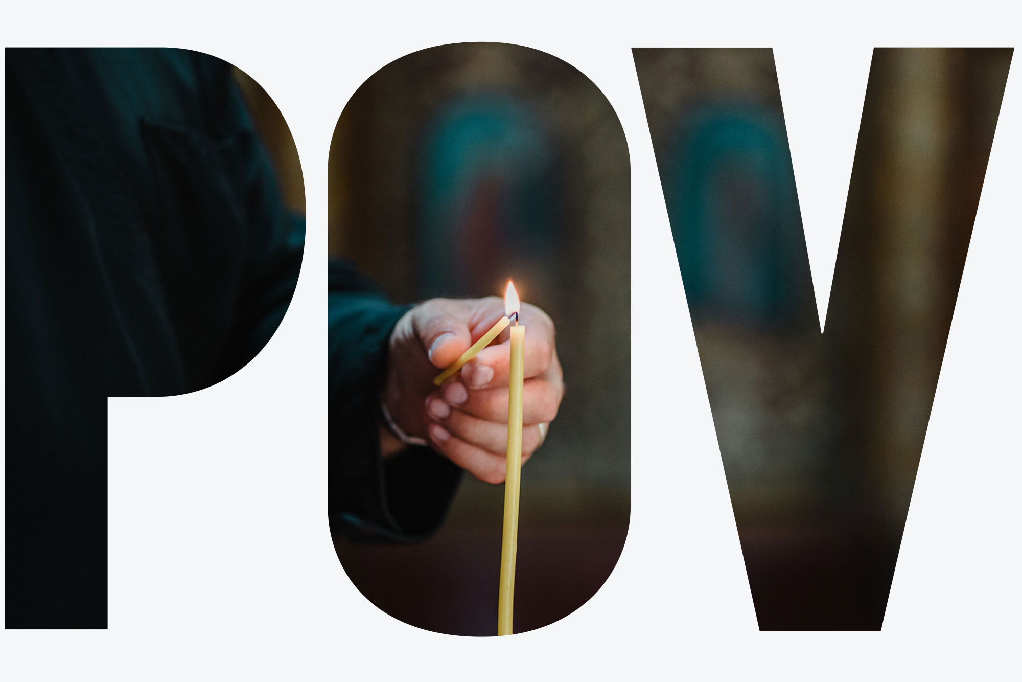 Photo: A stock photo of a clergy member lighting a candle in a church. A POV overlay rests ontop of the photo.