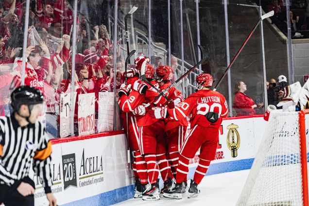 Photo: Terrier Men's Hockey players celebrating after scoring against Boston College on January 27. BU dropped back-to-back games to BC