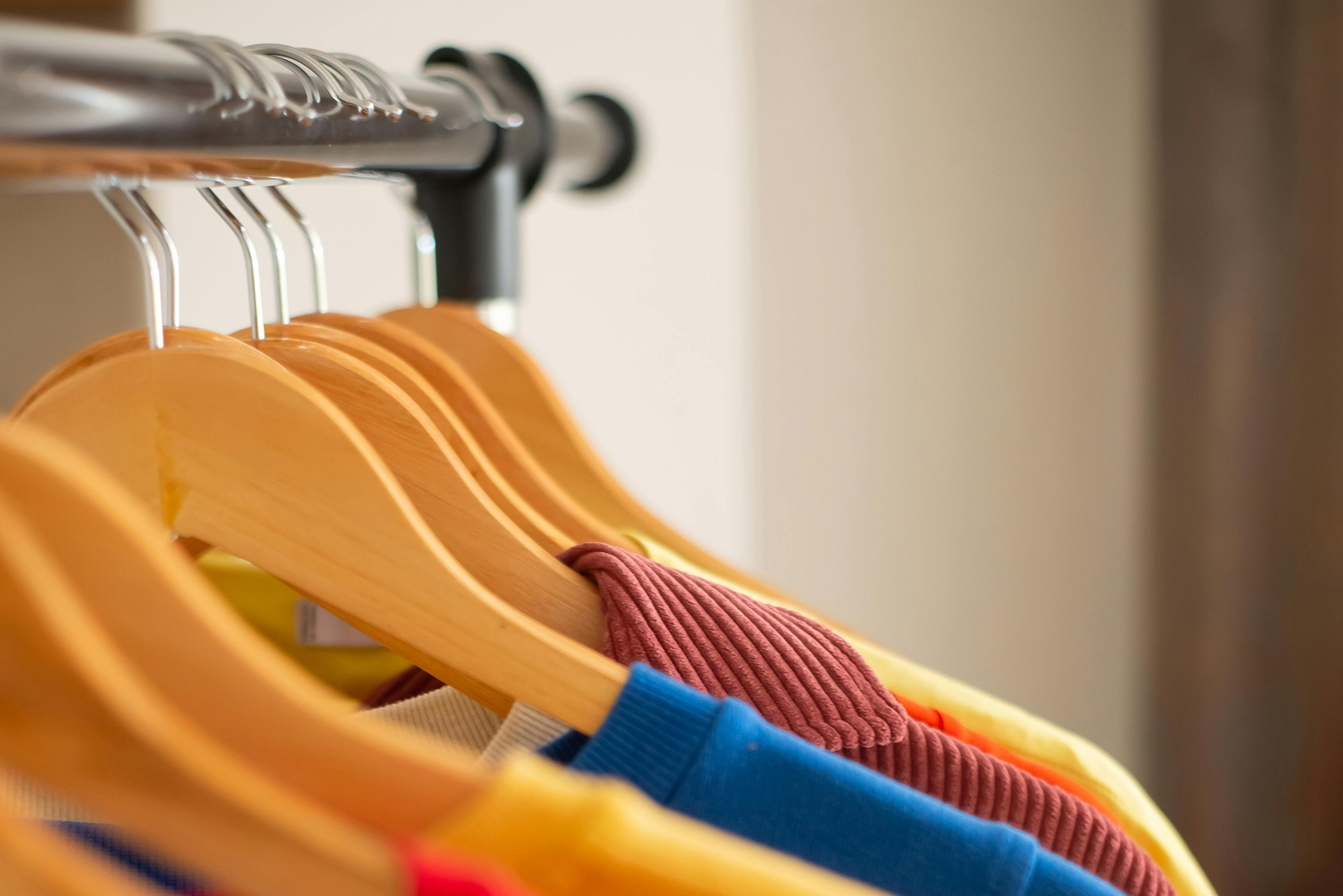 Photo: Clothing on a rack with hangers